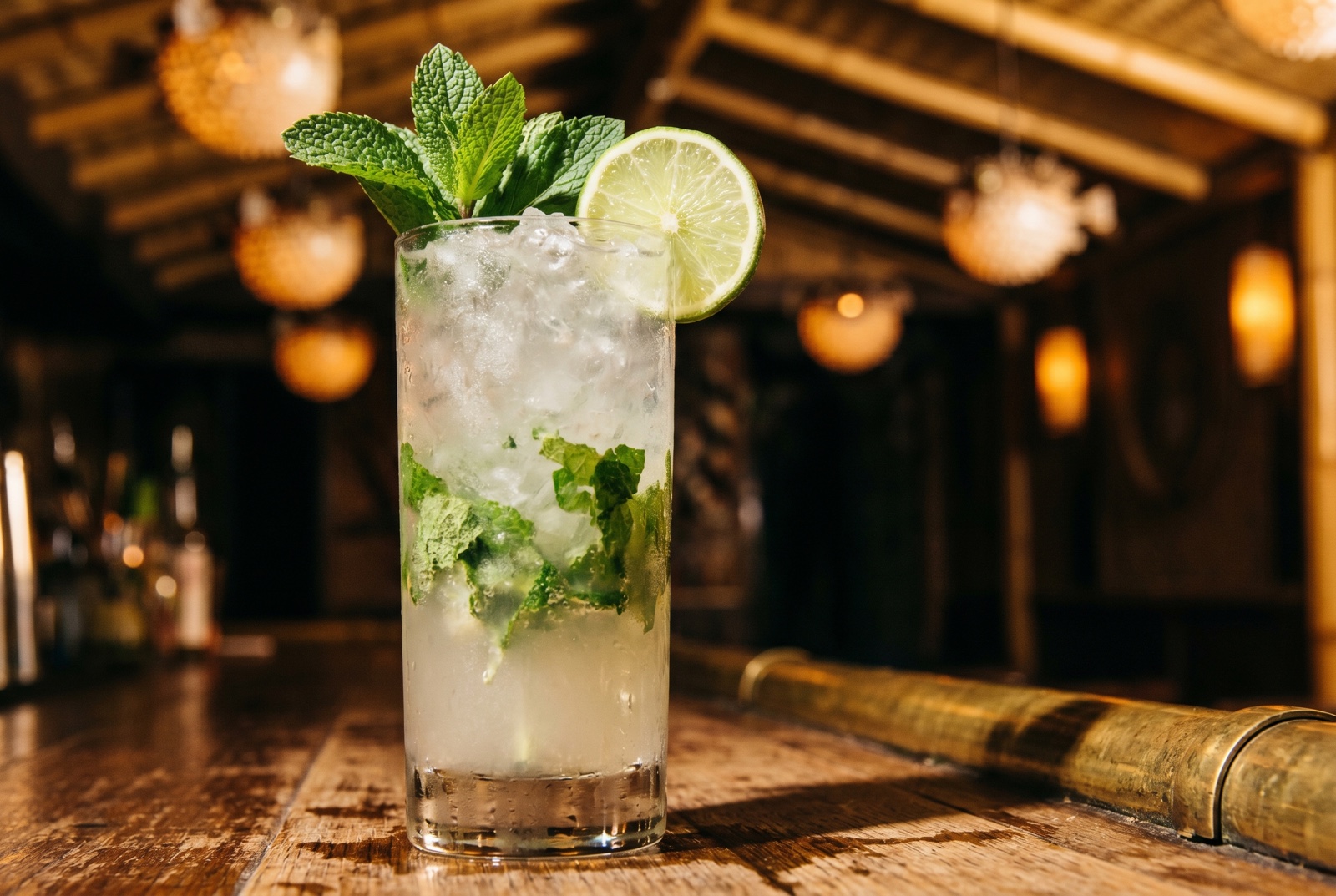 A classic Mojito—white rum, fresh mint, lime, sugar, and soda over crushed ice